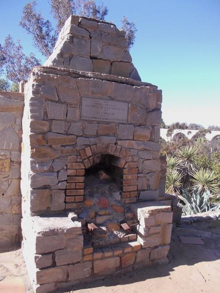 A closer photograph of the stately outdoor fireplace.