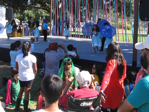 Youth perform on stage at the Diwali Mela in Balboa Park.