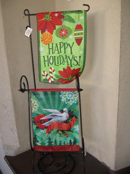 Banners outside the Balboa Park Visitors Center wish everyone Happy Holidays and Peace.